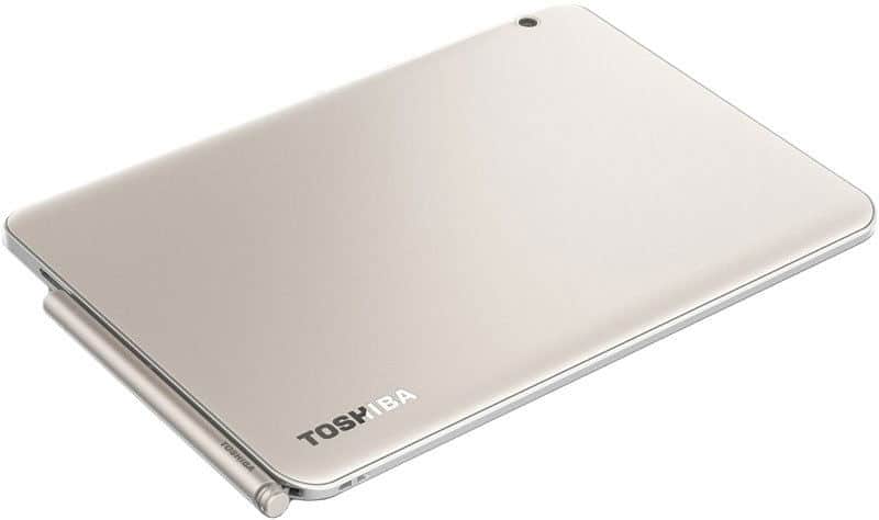 Toshiba convertible laptop closed in silver, angled to show logo and rear hinge, stylus alongside for tablet use.