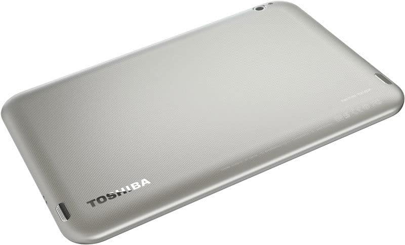 Toshiba tablet rear view showing silver textured back, brand logo in corner, rounded edges, and dual speaker grilles.