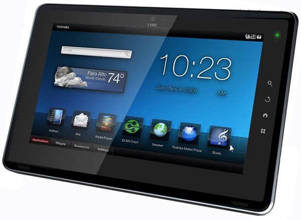Front view of Toshiba tablet home screen at 10:23 AM, 74°F in Palo Alto, with app icons for contacts, mail, browser, and music.
