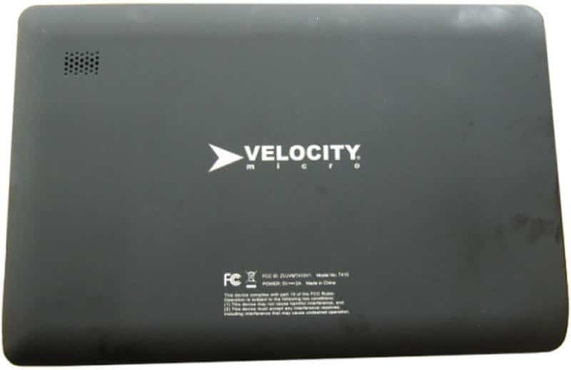 Velocity Micro tablet rear view showing centered logo, top left speaker grille, and product info near the bottom of the back cover.