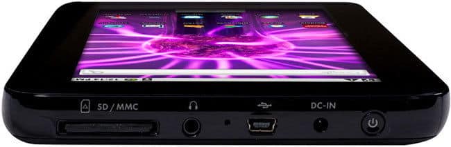 Front close-up of a black tablet displaying app icons, ports labeled SD/MMC, headphone jack, USB, DC-IN, and power button on edge.