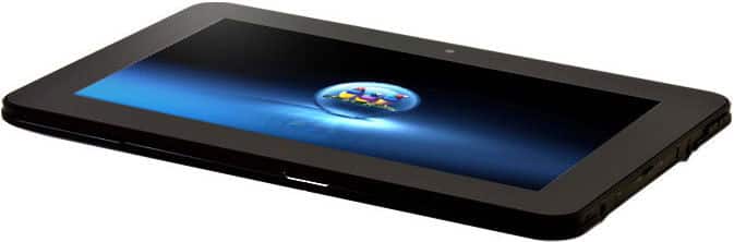 Black tablet, possibly Samsung Galaxy Tab, front view angled upward on a flat surface, screen shows blue gradient with circle graphic.