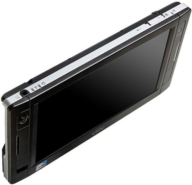 Black tablet, likely generic, wide screen, edge buttons, silver top strip; shown angled on white background for comparison.