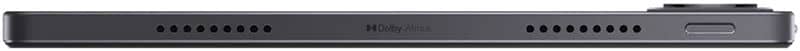 Side view of a black tablet, showing speaker grilles, USB-C port, and power button along the edge. Brand/model not specified.