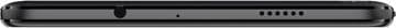 Bottom view of a tablet showing speaker grilles and ports along the edge