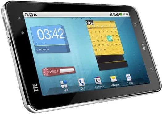 ZTE black touchscreen smartphone, tablet-like, angled front view showing clock, calendar, search bar, and core app icons.