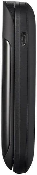 Alcatel One Touch 668 phone, side view showing closed flip design with curved black exterior and textured grip area