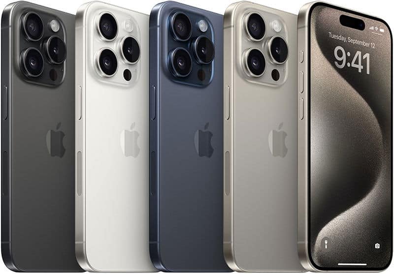 Apple iPhone 15 Pro Max in four colors shown from rear and front angles, displaying triple camera system and lock screen