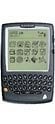 BlackBerry 5810 handheld device, front view, displaying screen with calendar and menu icons above a QWERTY keyboard