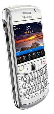 BlackBerry Bold 9780 smartphone shown from front, displaying colorful landscape photo on screen above physical QWERTY keyboard
