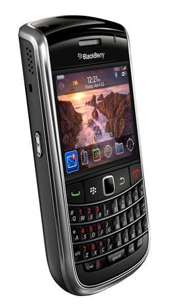 BlackBerry Bold 9650 front view, black phone with landscape display showing home screen and QWERTY keyboard below