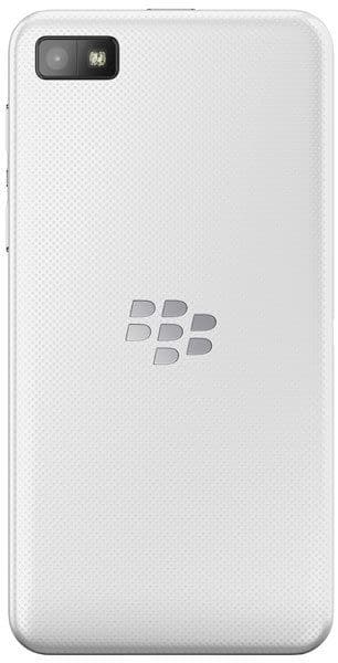 Rear view of white BlackBerry Z10 with textured back, camera and flash in top left, metallic logo centered.