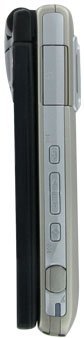 Casio EXILIM compact digital camera shown closed and open, displaying silver and black exterior with buttons on the spine