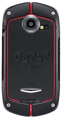Rear view of a rugged black and red Casio G'zOne Commando with camera, flash, textured grip accents, and central hexagonal shapes.