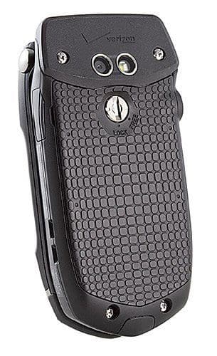 Casio G'zOne Rock front view, black rugged flip phone with textured honeycomb pattern, dual cameras, and silver accents