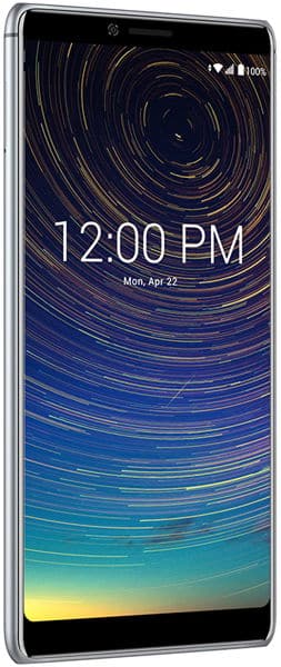 Front view of Coolpad Legacy showing large display, 12:00 PM, April 22, full battery, and star trails wallpaper.