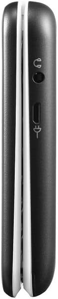 Side view close-up of a closed black and white Doro 6820 flip phone, displaying charging port and headphone jack.