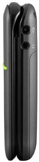 Doro PhoneEasy 409 flip phone, front view, closed, showing black exterior with green accent button and rounded edges