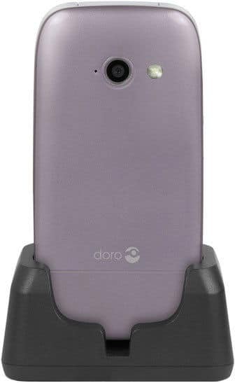 Doro PhoneEasy 632 rear view, lavender phone in black charging dock, showing camera and speaker