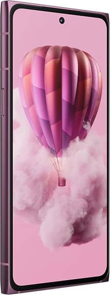 HMD Skyline phone displayed at an angle, showing its screen with a pink hot air balloon wallpaper against a cloudy sky background