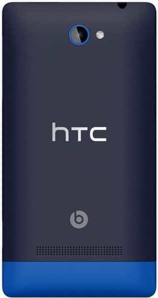 HTC Windows Phone 8S rear view, dark blue and navy body with blue accent band at bottom, camera and Beats logo visible