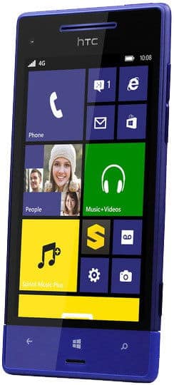 HTC 8XT front view, blue Windows Phone with colorful tile interface displaying Phone, People, Music+Videos, and Settings apps
