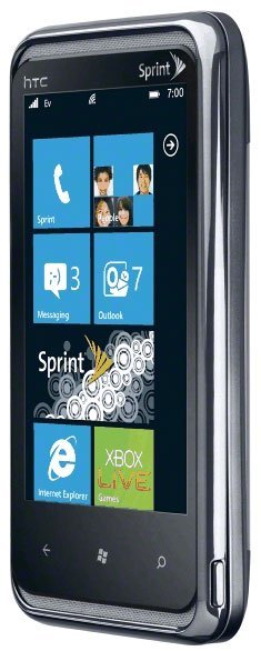 HTC Arrive smartphone, front view, displaying home screen with tiles for Phone, Messaging, Outlook, Internet Explorer, and Xbox Live Games