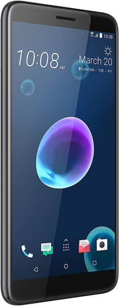 HTC Desire 12 front view, displaying home screen with time, date, and app icons at bottom