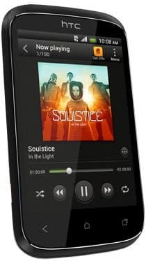 Front view of HTC Desire C showing music player screen with "Soulstice: In the Light" album cover and playback controls.