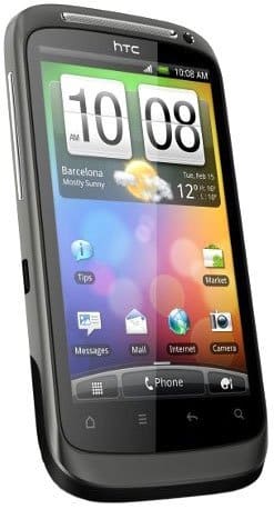 HTC Desire S smartphone, front view, displaying home screen with weather widget and app icons on colorful background