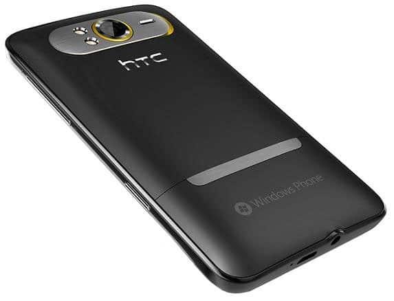HTC HD7S smartphone, rear view, showing black back with camera lens and gold ring accent