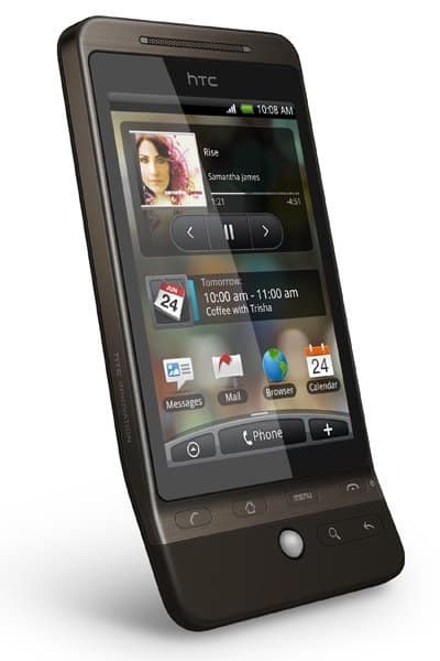 HTC Hero front view displaying home screen with music player, calendar event, and app icons including Messages, Mail, and Phone