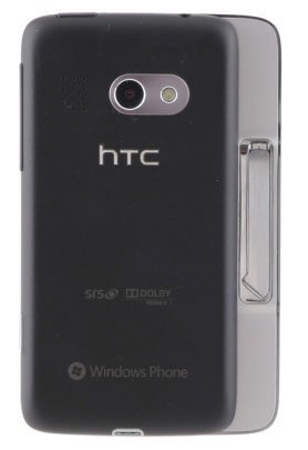 HTC Surround rear view, black phone with camera, speaker grille on side, Windows Phone branding visible