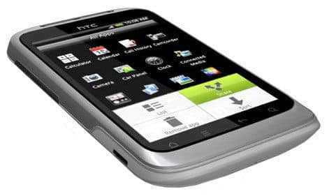 HTC Wildfire S smartphone, front view, displaying home screen with app icons and green accent bar