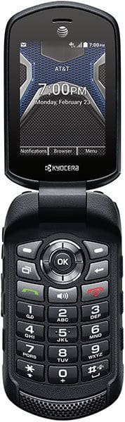 Kyocera DuraXE open flip phone, front view, showing time 7:00 PM on screen and numeric keypad below