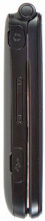 Side view of a closed LG Envoy flip phone with hinge button, volume rocker, covered port, and glossy black finish.