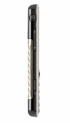 LG Masterpiece mobile phone, side view, displaying black exterior with cream-colored keypad strip