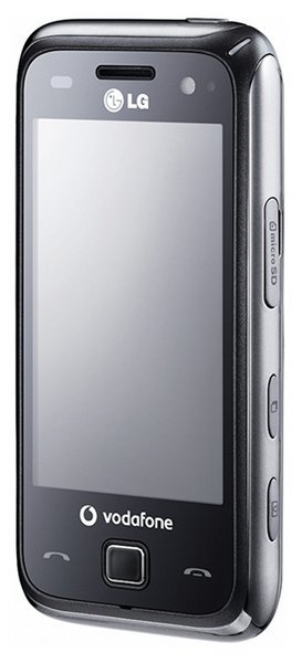 LG GM750 touchscreen phone in black, Vodafone branded, shown at left angle with front screen, side buttons, and rear camera visible.