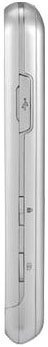 LG Prime flip phone, front view, closed position with silver metallic finish and buttons visible on spine