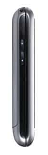 Side view of closed LG Breeze flip phone in silver and black, highlighting the side-mounted volume button.
