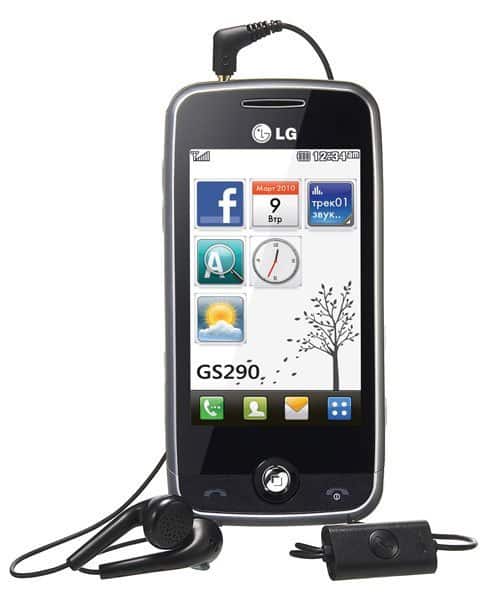 Front view of black LG GS290 (LG Breeze) upright with wired headset; screen displays app icons, date, time, and tree graphic.