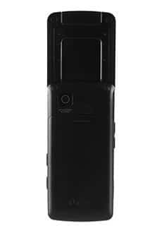 Rear view of black LG LX-290 slider phone with upper section open, showing sliding mechanism, camera lens, and speaker.