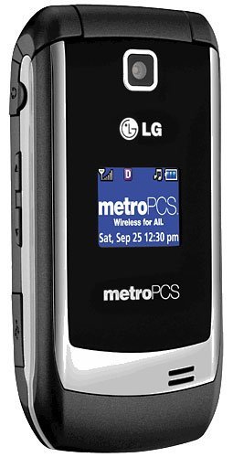 LG Select black and white flip phone open, displaying Metro PCS screen with date and time