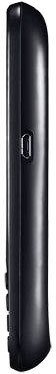 Side view of a black remote control with slim profile, curved edges, and a side button, similar to LG Optimus Pro design.