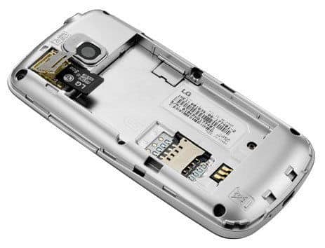 LG Phoenix rear view showing camera, speaker, battery compartment, and SIM card slots