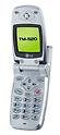 LG TM520 flip phone, front view, open position showing small screen and numeric keypad
