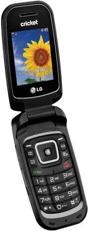 LG True flip phone open, displaying sunflower wallpaper, Cricket branding visible on screen