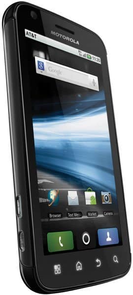 Motorola ATRIX 4G front view, displaying home screen with Google search bar, landscape image, and app icons including phone, contacts, and camera