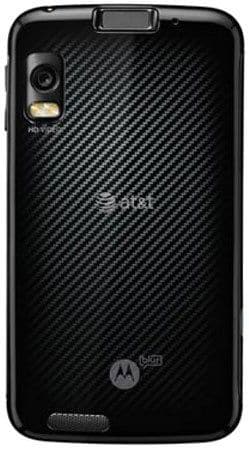 Motorola ATRIX 4G rear view, showing black carbon fiber pattern back with camera lens, AT&T branding, and Motorola logo
