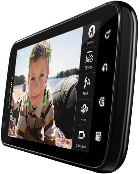 Motorola ATRIX 4G front view with camera app open, showing portrait photo and shooting controls on screen